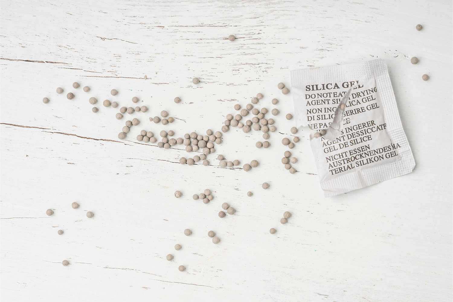 What is silica gel and why do I find little packets of it in everything I  buy?