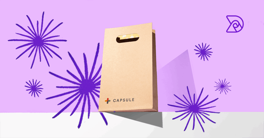 A Paper Pharmacy bag built by Dymapak for Client Capsule. The Bag is arranged heroically in front of playful purple fireworks